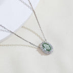 0.823ct Fancy Green Radiant Cut Lab Grown Diamond Necklace – 9K White Gold with Diamond Halo