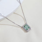 0.669ct Fancy Green Radiant Cut Lab Grown Diamond Necklace – 9K White Gold with Diamond Halo